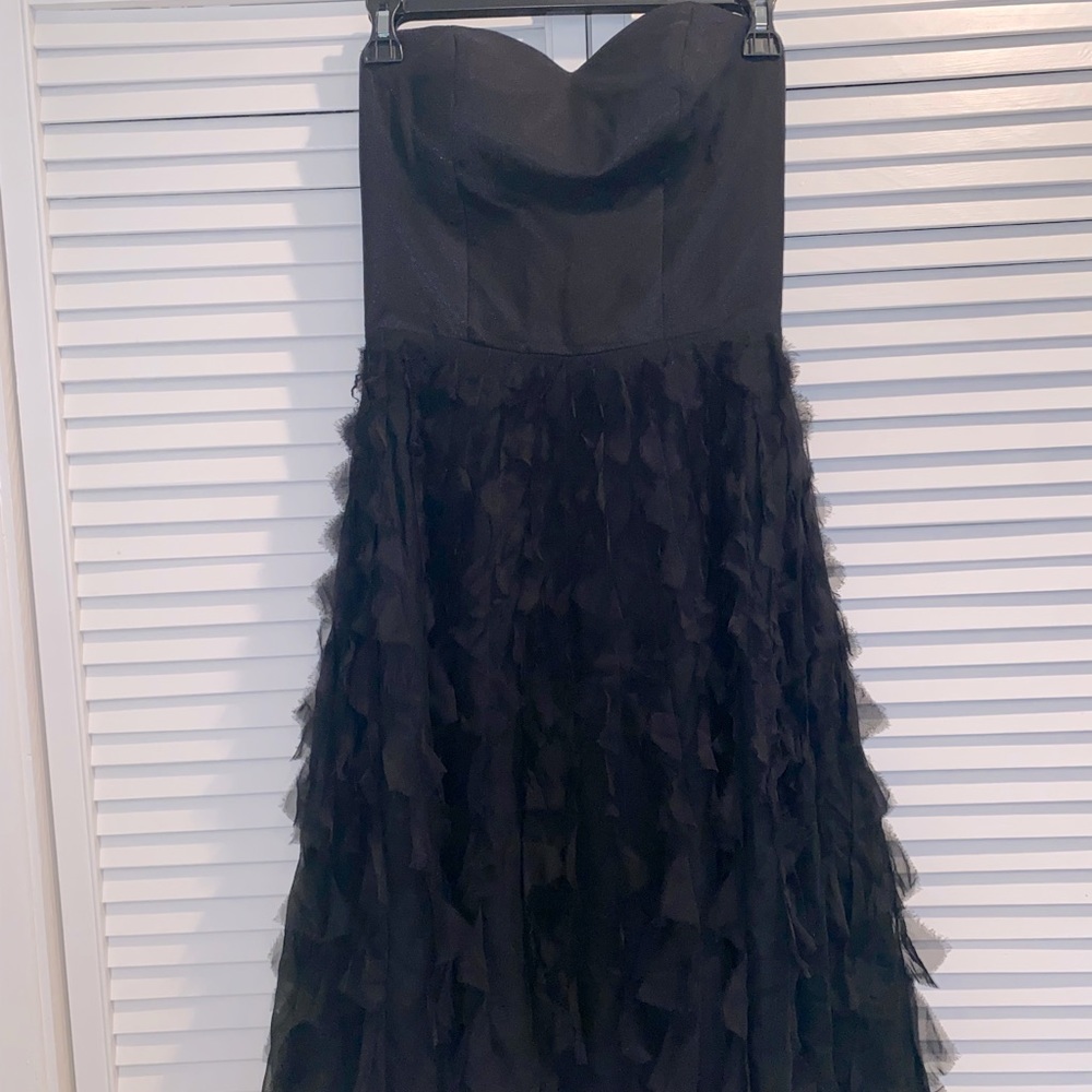 Strapless black dress with ruffles